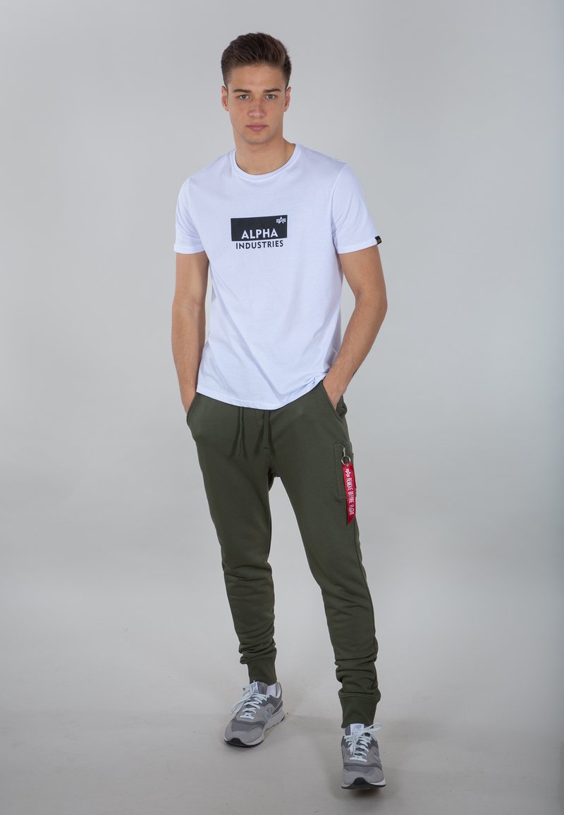 Alpha Industries Donji dijelovi trenirke - dark green