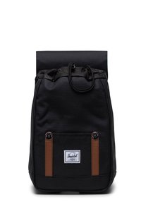 Black backpack with a roll-top design, brown leather accents, adjustable drawstring closure, and a front pocket with logo.