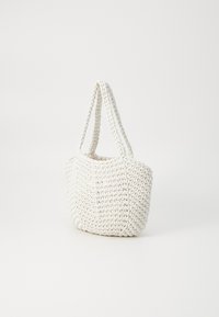 White, woven tote bag with a textured surface, braided handles, and a spacious design, suitable for casual use.
