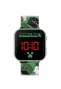 Orologio digitale con quadrante nero, numeri rossi, cornice argentata e cinturino verde a fantasia che rappresenta personaggi ed elementi di Minecraft.