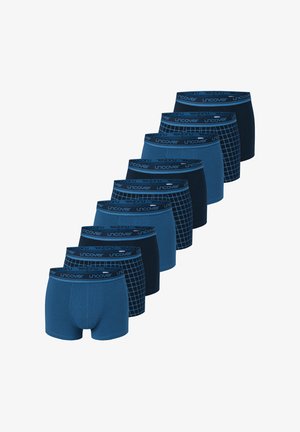 Zehn Paar blaue Boxer-Shorts mit verschiedenen Mustern, Texturen und einem Bund mit dem "uncover"-Logo. Verschiedene Blautöne und Designs.