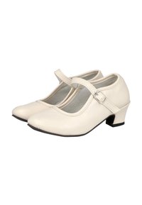 Un par de zapatos Mary Jane color crema con tacones bajos y una sola correa con hebilla en la parte superior, exhibidos sobre un fondo blanco.