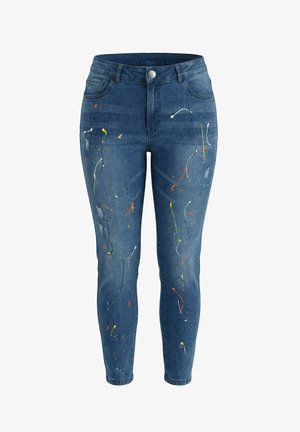 Blaue Skinny-Jeans mit Farbspritz-Design in Weiß, Gelb, Orange und Schwarz, mit vorderen und hinteren Taschen und Knopfverschluss.