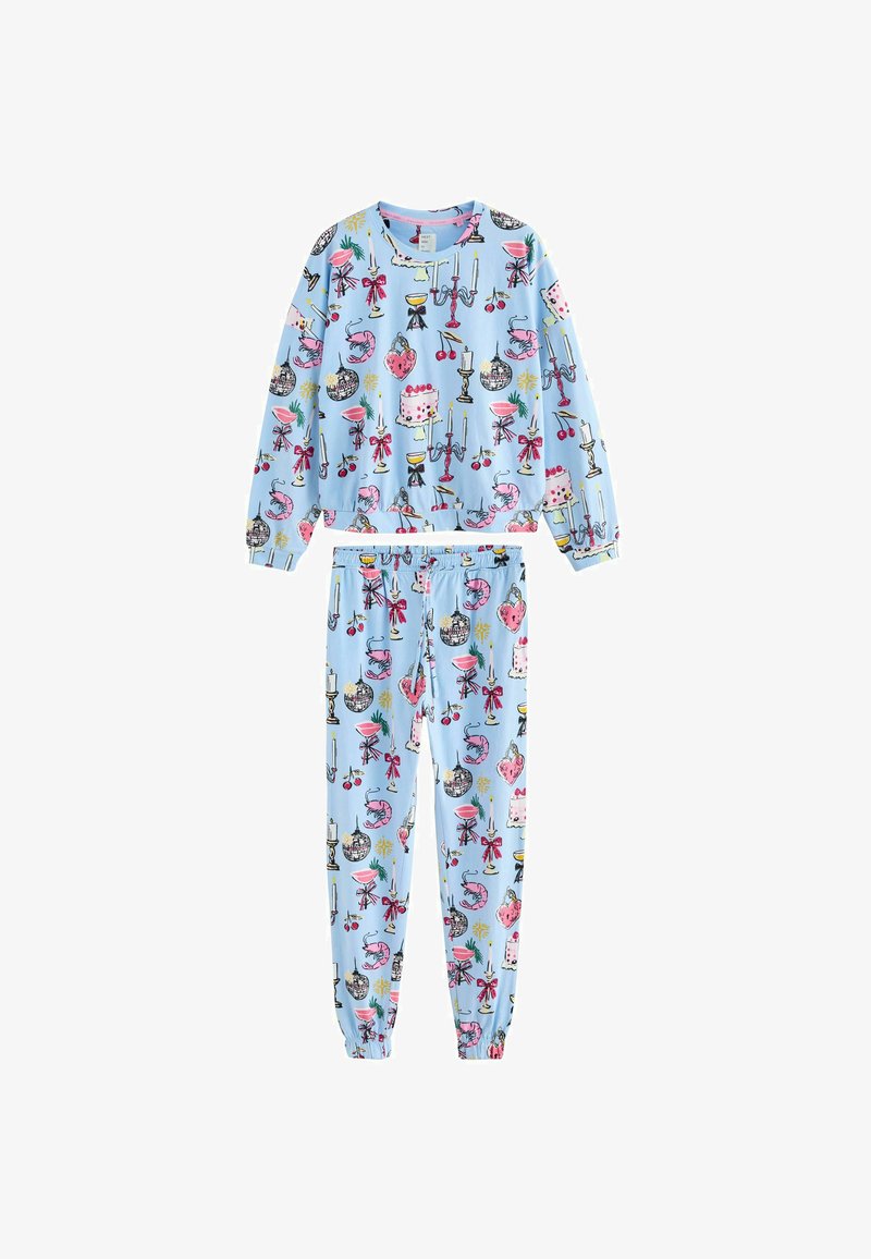 Blå pyjamasset med ett mönster av tårtor, ljus och dekorationer; materialet är mjukt och elastiskt med resår i ärmarna.