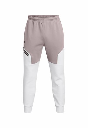 Joggers de color rosa claro y blanco con cintura elástica, bolsillo lateral, textura suave y bloques de color contrastante en las piernas.