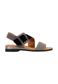 Gray and black suede sandal with a wide strap, adjustable buckle, and a brown leather insole. Low, flat black rubber sole.