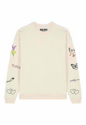 Lichtbeige sweatshirt met een ronde hals, lange mouwen en verschillende kleurrijke grafische ontwerpen: bloemen, vlinders en tekstaccenten.