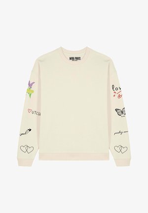 Light beige sweatshirt with a crew neckline, long sleeves, and various colorful graphic designs: flowers, butterflies, and text accents.