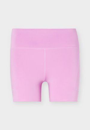 Shorts de sport taille haute rose clair avec coutures plates et poches latérales, posés à plat sur un fond blanc.