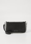 BRYANT XBODY POUCHETTE - Cross body bag - black