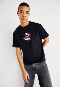 Levi's® VINTAGE FIT GRAPHIC - Marškinėliai su spaudiniu - lse_batwing badge floral caviar