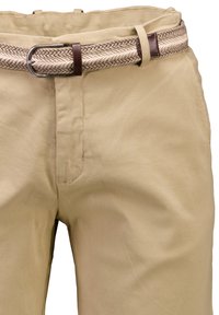 Beige trousers with a woven beige and brown belt threaded through belt loops on a plain white background.