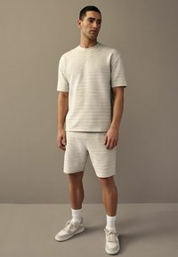 Next TEXTURED OTTOMAN REGULAR FIT - Tracksuit bottoms - grey