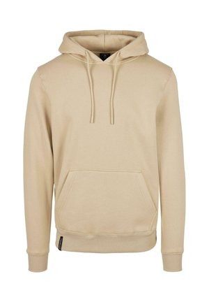 Beige hoodie met een voorzak, capuchon met trekkoord, ribgebreide manchetten en zoom, gemaakt van zachte stof, met een label aan de onderkant.