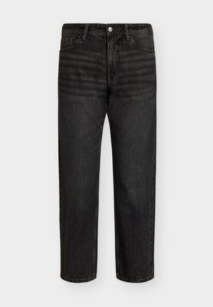 Schwarze Denim-Jeans mit geradem Schnitt, mittelhoher Taille, fünf Taschen und Metallknopfverschluss. Glatte Textur mit subtiler Ausbleichung.