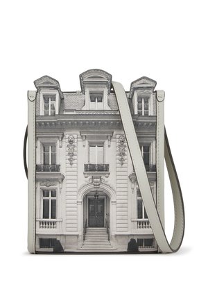 Crossbody bag featuring a printed gray-scale architectural design. Soft leather material with a structured shape and adjustable strap.