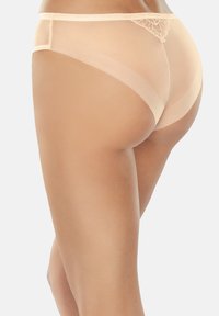 Durchsichtige hautfarbene Unterwäsche mit Spitzenakzent auf der Rückseite. Der Stoff ist glatt, leicht und zeichnet sich durch ein halbtransparentes Design mit hipster Schnitt aus.