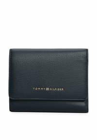 Black textured leather wallet with gold Tommy Hilfiger logo centered on the front flap, against a plain white background.