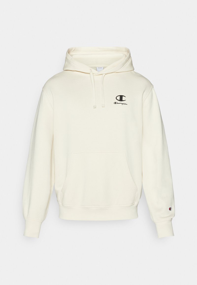Sudadera color crema hecha de tela suave. Cuenta con un bolsillo frontal, capucha con cordón y logo bordado en negro en el lado izquierdo del pecho.