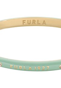 Kuldtooni metallist käevõru, millel on piparmündiroheline emailviimistlus. Omab graveeritud "FURLA" ja "FURLA 1927," ning väikest selget krištalli aksessuaari.