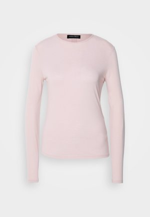 Langermet skjorte i myk lys rosa stoff med rund hals og en tettsittende design. Glatt tekstur uten synlige mønstre eller detaljer.