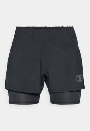 Calções desportivos pretos com uma camada interior incorporada. Apresentam uma cintura elástica e um logotipo na parte inferior. Material liso e que afasta a humidade.
