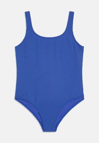 Maillot de bain une pièce bleu en tissu texturé. Il présente de fines bretelles et un décolleté échancré. Doublure intérieure lisse.