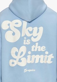Light blue pullover hoodie with white text that says "Sky is the Limit" in varying font styles. The brand name "Dropsize" is also present.