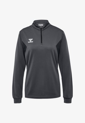 Zwarte longsleeve sportpullover met hoge kraag, kwart ritssluiting, mesh-textuur en contrasterende zwarte zijpanelen. Hummel-logo op de borst.