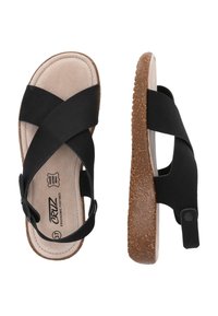 Svarta sandaler med korsremmar, justerbar bakdel och ergonomisk fotbädd. Har en texturerad brun sula för grepp och komfort.