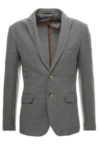 Blazer gris en tissu texturé, avec un col cranté, deux poches avant et deux boutons marron à l'avant. Intérieur doublé.