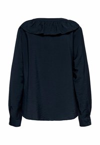 Blouse noire à manches longues avec un détail froncé au niveau du dos supérieur et des poignets à boutons.