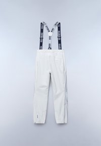 White waterproof pants with adjustable navy suspenders featuring repeating brand name. Zippered ankle openings and back pocket detail.