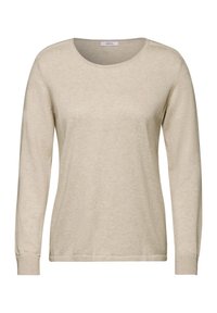 Pitkähihaista crew neck -paitaa vaaleassa beessissä, valmistettu pehmeästä kankaasta. Varusteena ribbaus hihansuissa ja helmassa, sekä sileä, puoliksi läpikuultava pinta.