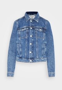 Denim jacket in medium blue with a collared neckline, two chest pockets, and silver-tone buttons. Cropped fit with long sleeves.