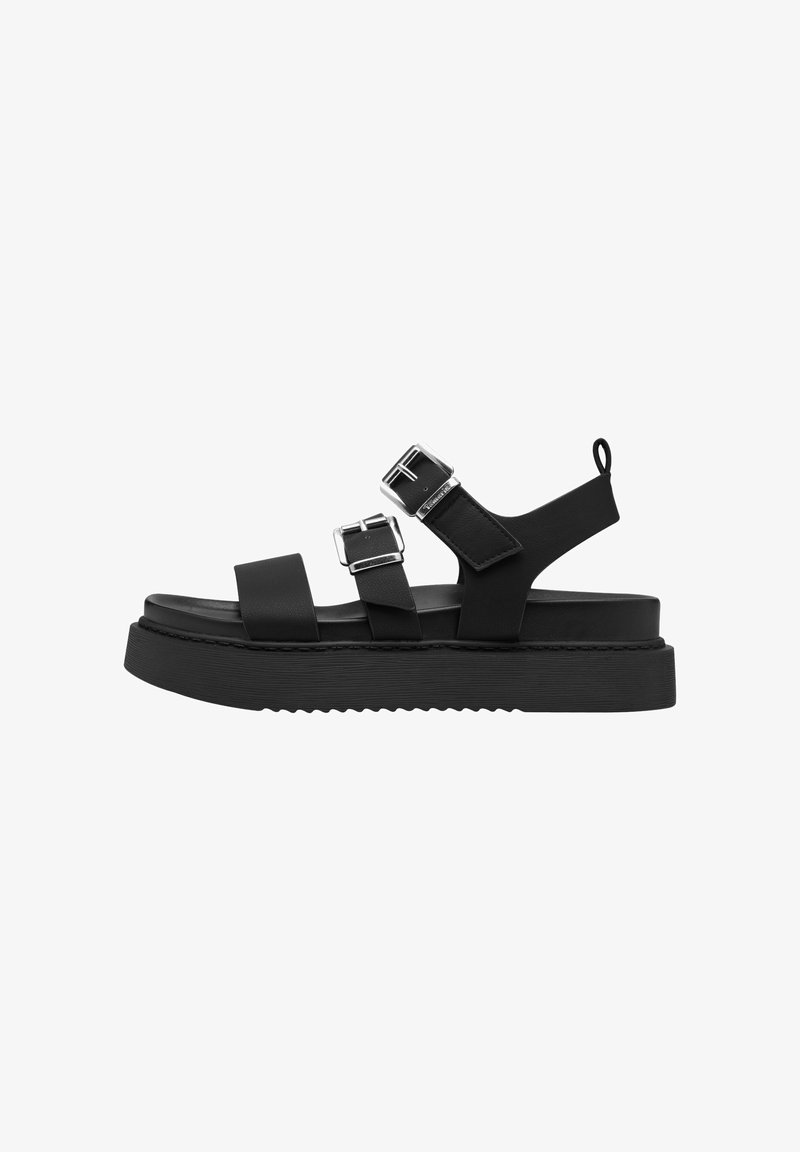 Black platform sandals with two adjustable straps, silver buckles, and a textured rubber sole. Smooth synthetic material with minimal design.