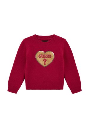 Maglione lavorato a maglia rosso con un cuore dorato su cui è scritto "GUESS?" in lettere rosse, decorato con pailettes, colletto rotondo e maniche lunghe.