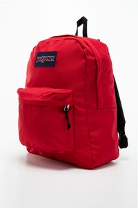 Sac à dos rouge en tissu durable, comportant un compartiment principal, une poche zippée à l'avant, des bretelles noires réglables et une poignée supérieure.
