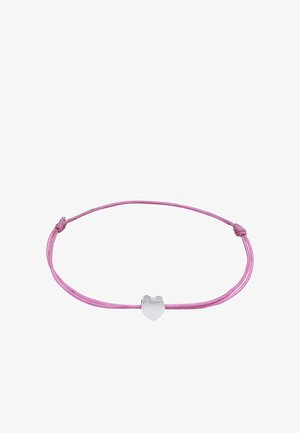 Pink cord bracelet featuring a silver heart charm, with a simple design and adjustable closures. Cord is smooth with a slight sheen.