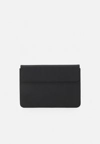 Black, envelope-style bag made of smooth material; features a flap closure and minimal branding; rectangular shape with clean lines.