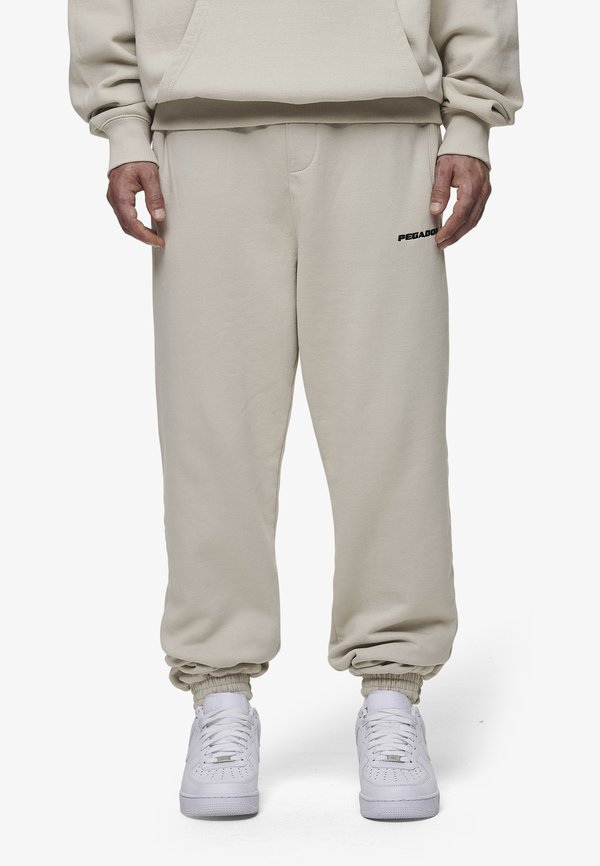 LOGO JOGGER - Tracksuit bottoms - washed light beige