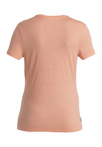 T-shirt a maniche corte e collo rotondo in morbido tessuto pesca. Presenta una texture liscia senza motivi o accenti visibili.