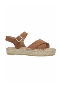 Brown suede slingback sandal with cross-over straps, an adjustable buckle, and a woven jute-style platform sole. Flat, open design.