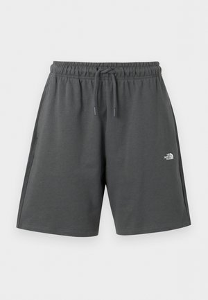 Tmavomodré športové šortky s elastickým pásom a sťahovacou šnúrkou, s malým bielym logom "The North Face" na pravej stehne.