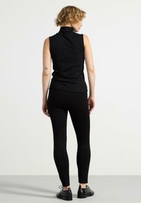 Lindex Leggings - Byxor - black