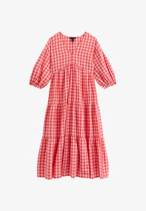 Red and white gingham dress with a V-neckline, three-quarter puff sleeves, and tiered skirt design. Made from lightweight fabric.