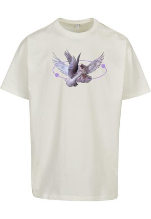T-shirt couleur crème avec un graphisme central représentant un oiseau aux ailes déployées, accentué par des motifs circulaires violets. Fabriqué en tissu léger.