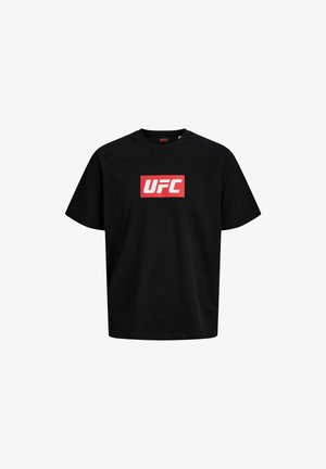 Must musta, millest on tehtud, keskkomplekti punane ristkülikukujuline logo valgete tähtedega "UFC". Lühikesed varrukad ja ümmargune kaelus.