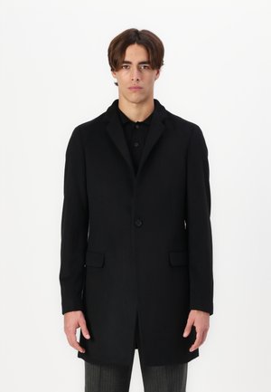 Palton negru; țesătură din amestec de lână; închidere cu un singur nasture; rever cu tăieturi; două buzunare frontale; croi ajustat; textură netedă; design de lungime până la genunchi.