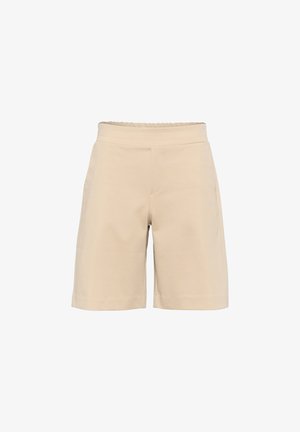 Beige Baumwollshorts mit elastischem Bund, die ein einfaches Design und einen geraden Schnitt aufweisen. Zwei seitliche Taschen sind sichtbar.